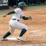 Natalia Kenyatta with a base hit at Secchia Stadium