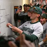 Nolan Higgins applies Michigan State's sticker to the 2026 Big Ten Baseball Tournament after the Victory for MSU over Iowa on May 20, 2026.