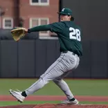 Aidan Donovana action in wind-up to deliver a pitch.