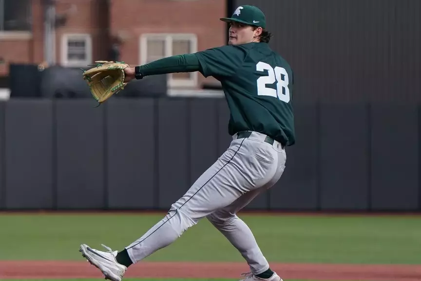 Aidan Donovana action in wind-up to deliver a pitch.
