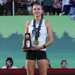 Kate Stewart-Barnett at the podium at the NCAA Championships