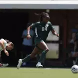 Kennedy Bell gets past a UNC defender