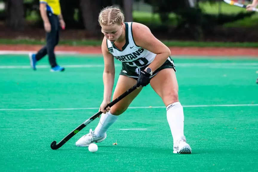 Ellie Kendall hits the ball at Ralph Young Field
