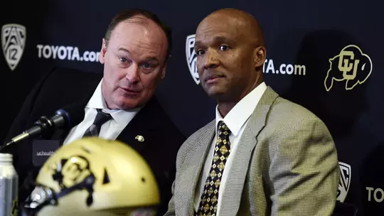 Rick George and Karl Dorrell