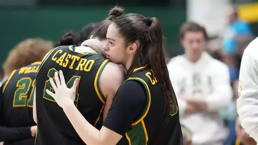 Aina Cargol hugging Sol Castro vs. LMU 2026