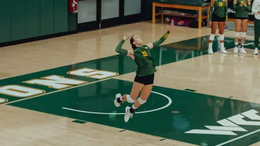 Petra Fritz serving vs. Cal State East Bay 2026