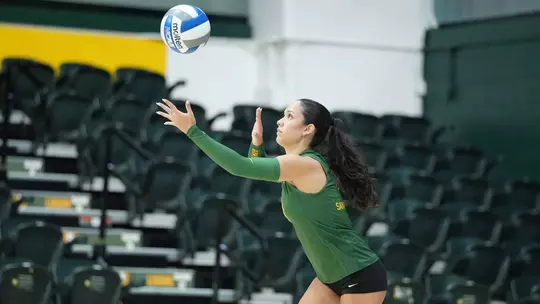 Adelynn Legates serving vs. CSU Bakersfield 2026