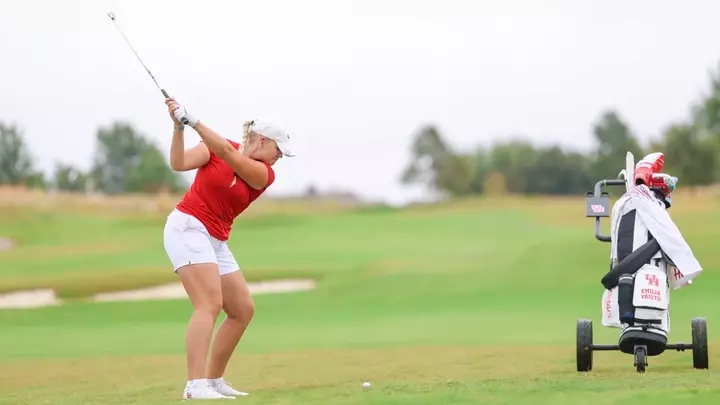 Emilia Väistö hits her approach shot from the fairway
