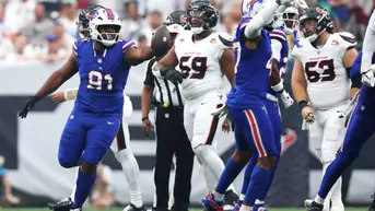 Sep 13, 2026; Houston, Texas, USA; Buffalo Bills defensive tackle Ed Oliver (91) reacts after a recovery during the first quarter against the Houston Texans at Reliant Stadium. Mandatory Credit: Troy Taormina-Imagn Images
