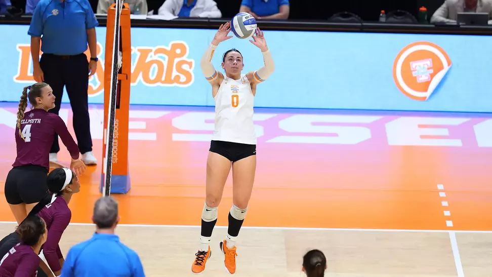 Izzy Mogridge Sets Ball in Match Against Texas A&M
