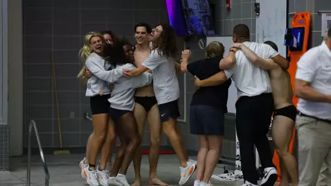 Team Celebrates with Bennett Greene Following 1-Meter Diving Win