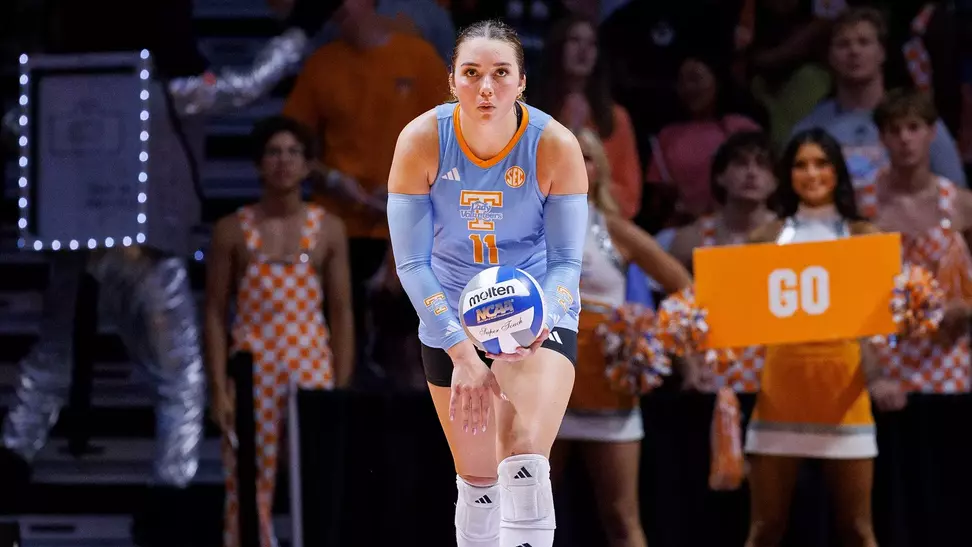 Caroline Kerr Prepares for Serve in Home Match