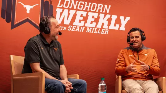 Coach Miller with Craig Way on set of Longhorn Weekly radio show