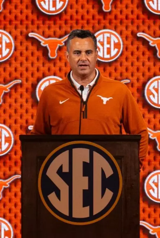 Coach Miller at podium during 2026 SEC Media Day