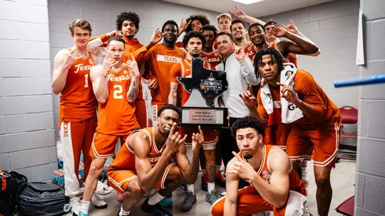 Men's Basketball celebrates following win at Texas A&M in Cotton Holdings Lone Star Showdown
