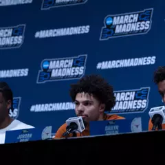 Tramon Mark, Jordan Pope and Dailyn Swain on the podium for the pre-NCAA Second Round presser