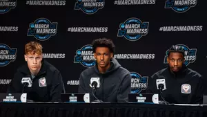 Men's Basketball pre-NCAA Sweet 16 player presser at podium