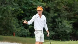Luke Potter after making putt