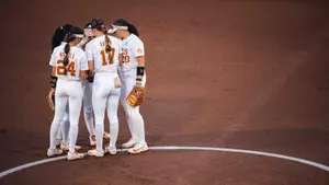 Team huddle vs. Arizona State 2026