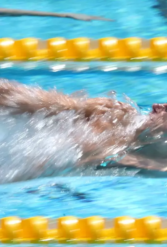 IRVINE, CALIFORNIA - AUGUST 12: Will Modglin of of Team United States competes in Heat 3 of the Men's 100m Backstroke on Day 1 of the Pan Pacific Swimming Championships at William Woollett, Jr. Aquatics Center on August 12, 2026 in Irvine, California. (Photo by Sean M. Haffey/Getty Images)
