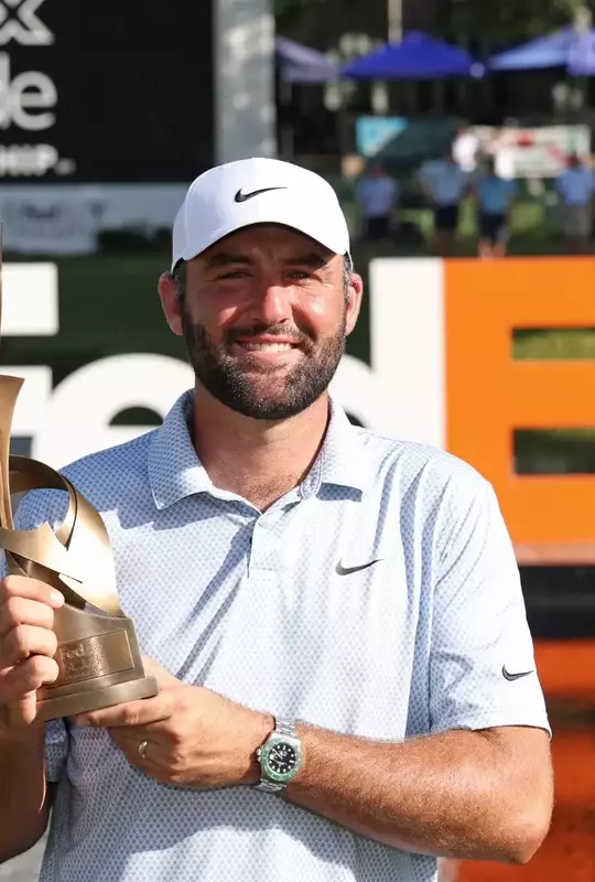MEMPHIS, TENNESSEE - AUGUST 16: Scottie Scheffler of the United States celebrates with the trophy after winning during the final round of the FedEx St. Jude Championship 2026 at TPC Southwind on August 16, 2026 in Memphis, Tennessee. (Photo by Stacy Revere/Getty Images)