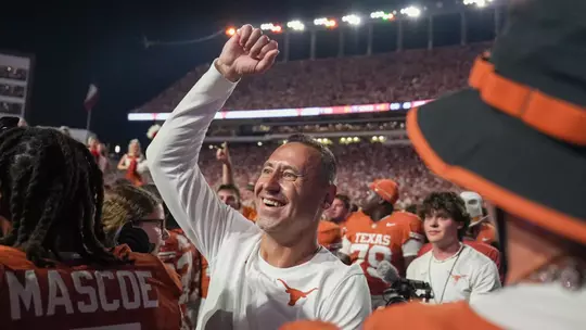 Steve Sarkisian celebrates after beating No. 1/1 Ohio State