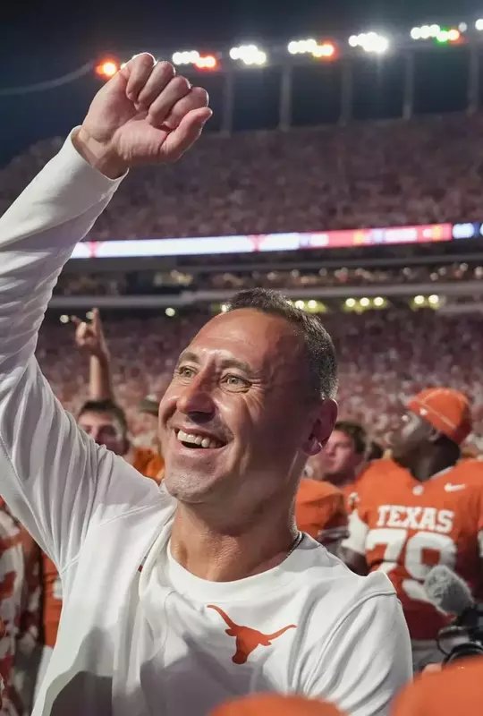 Steve Sarkisian celebrates after beating No. 1/1 Ohio State