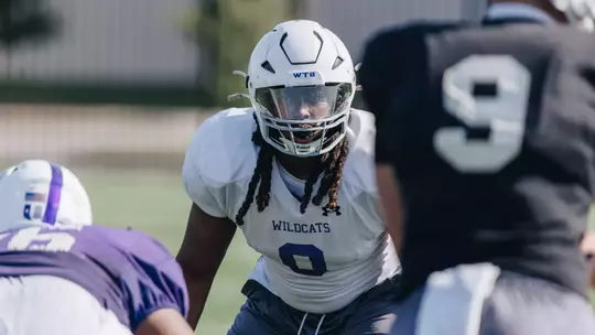 After a year on the sideline, all-conference linebacker Moore returns to field