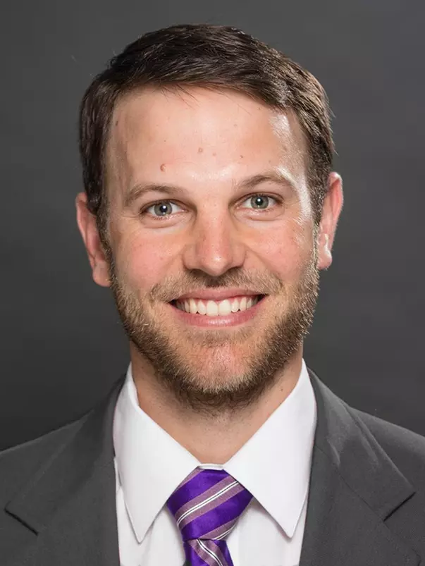 Harrell head shot edited no dot filter