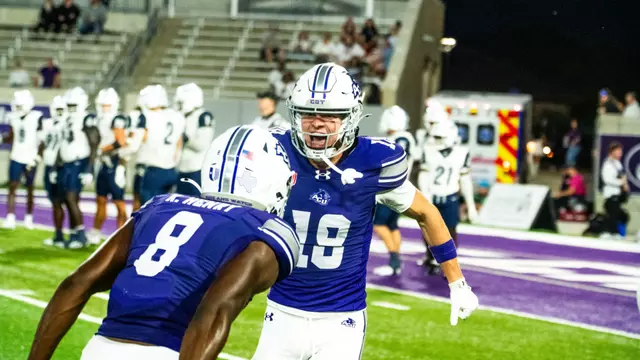 Seth Weller celebrates with Keonde Henry after a play against West Florida on Oct. 3, 2026.