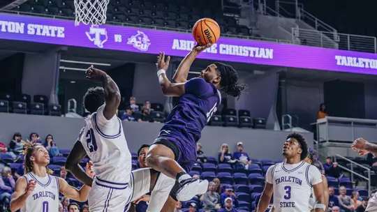 Bradyn Hubbard leaps to attempt a shot at close range at Tarleton State on Feb. 16, 2026