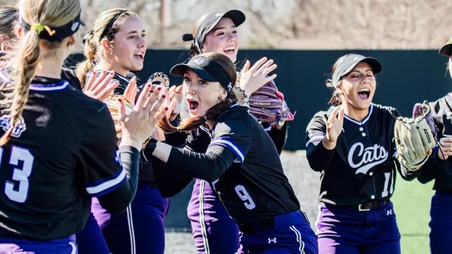 Emerson Meggers runs through a high-five line of teammates before playing South Dakota State on February 11, 2026
