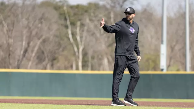Rick McCarty gives a thumbs up during a road practice in 2025.