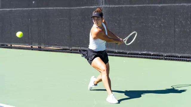 Masha Vrsalovic returns the ball to her opponent.
