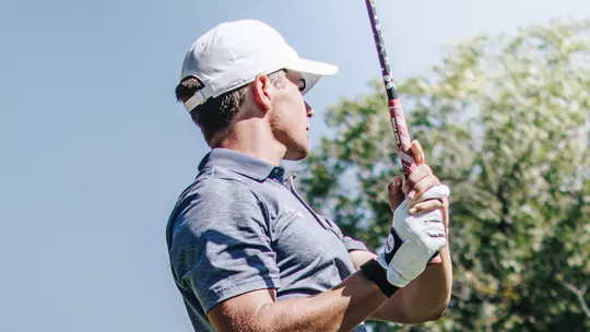 Colin Leonard watches a shot at an ACU men's golf practice in Abilene, Texas on Sept. 11, 2025.