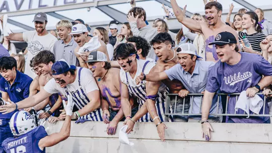 ACU student section celebrates with receiver Luke Moffitt after beating Tarleton State on Nov. 1, 2025