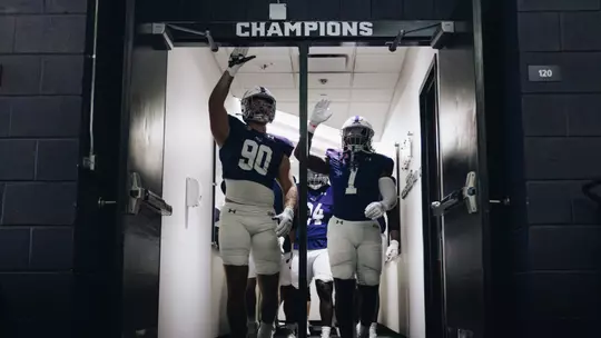 ACU players walk out of the home locker room before playing Stephen F. Austin on September 6, 2025