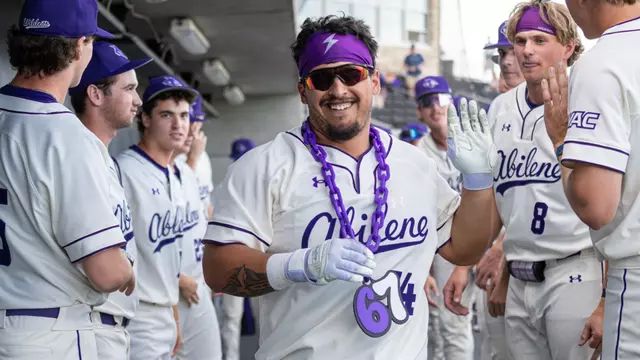Diego Cardenas smiles after getting high-fives from teammates during a game against LMU on March 14, 2026