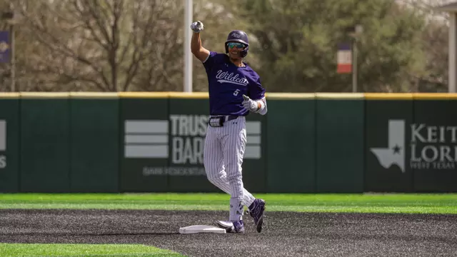 Nick Arias smiles to the dugout after hitting a double against LMU on March 15, 2026