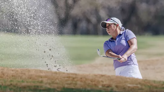 Ryann Honea takes a swing in a bunker in the West Texas Classic at Abilene Country Club on March 2-3, 2026.