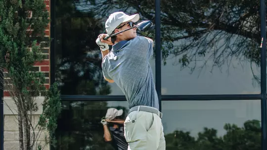 Preston DeFriend takes a swing at an ACU men's golf practice in Abilene, Texas on Sept. 11, 2025.