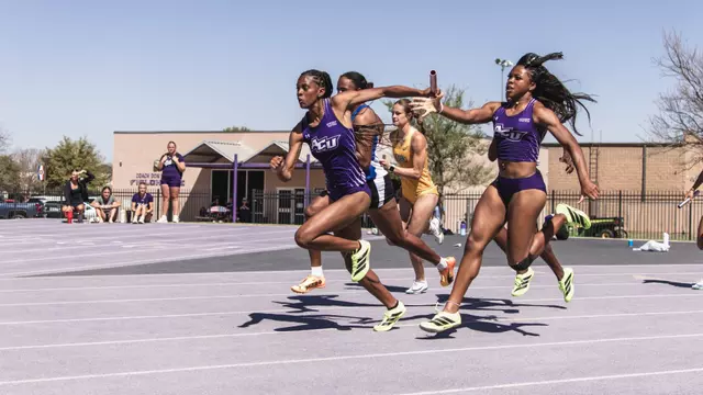 Morgan Morris (left) and Chianel Asoburuenwu run in the women's 4x100 relay at the Wes Kittley Invitational on March 21, 2026