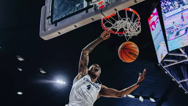 Rich Smith throws down a slam dunk against UT Arlington on February 12, 2026