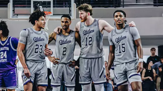 Teammates Joseph Venzant, Yaniel Rivera, Cade Hornecker, and Bradyn Hubbard talk on the court vs. Tarleton State on February 14, 2026