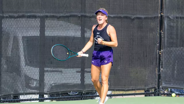 Elsa Luthar yells in celebration after winning a point against her opponent on April 1, 2026 against UT Arlington.