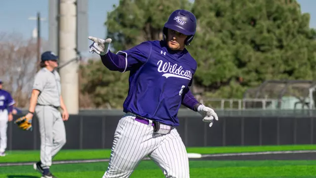 Grant Watkins points to the dugout after hitting a home run in ACU's 8-7 win over Oral Roberts at Crutcher Scott Field at Bullock Brothers Ballpark on Feb. 22, 2026.