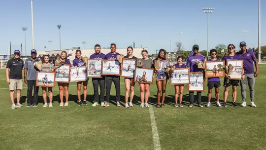 ACU track and field seniors pose up for a picture at a ceremony during the Wes Kittley Invitational on March 21, 2026
