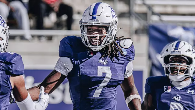 Javon Gipson smiles and jogs to the sideline after a touchdown catch against Lamar on November 29, 2025