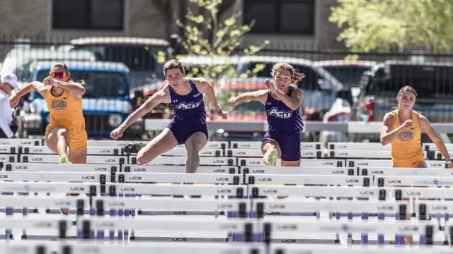 Natalie Poe (left) and Skyla Riedel run the hurdles during the 2026 Wes Kittley Invitational