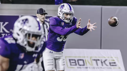 Hugo Nash prepares to catch the snap and punt against Austin Peay in September 2025